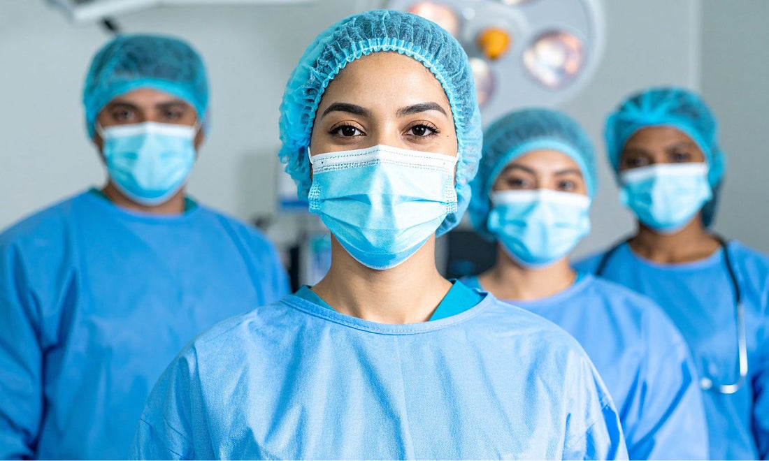 Medical room with attendants wearing facial mask