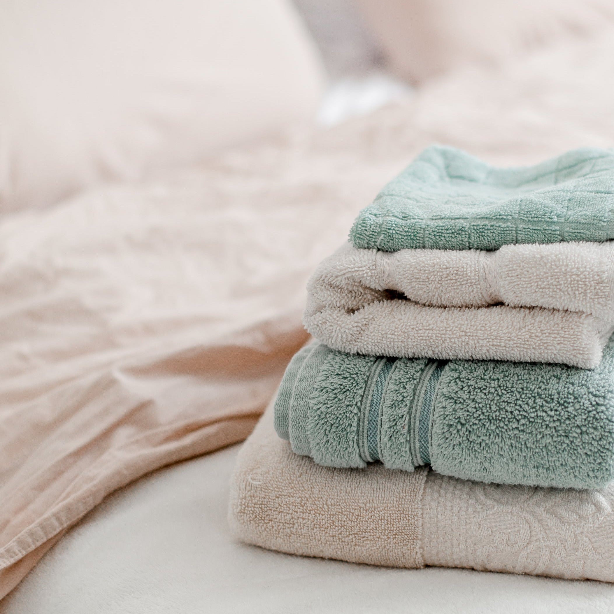 clean towels on a bed