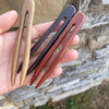 all three Riverbend hair sticks in palm of hand